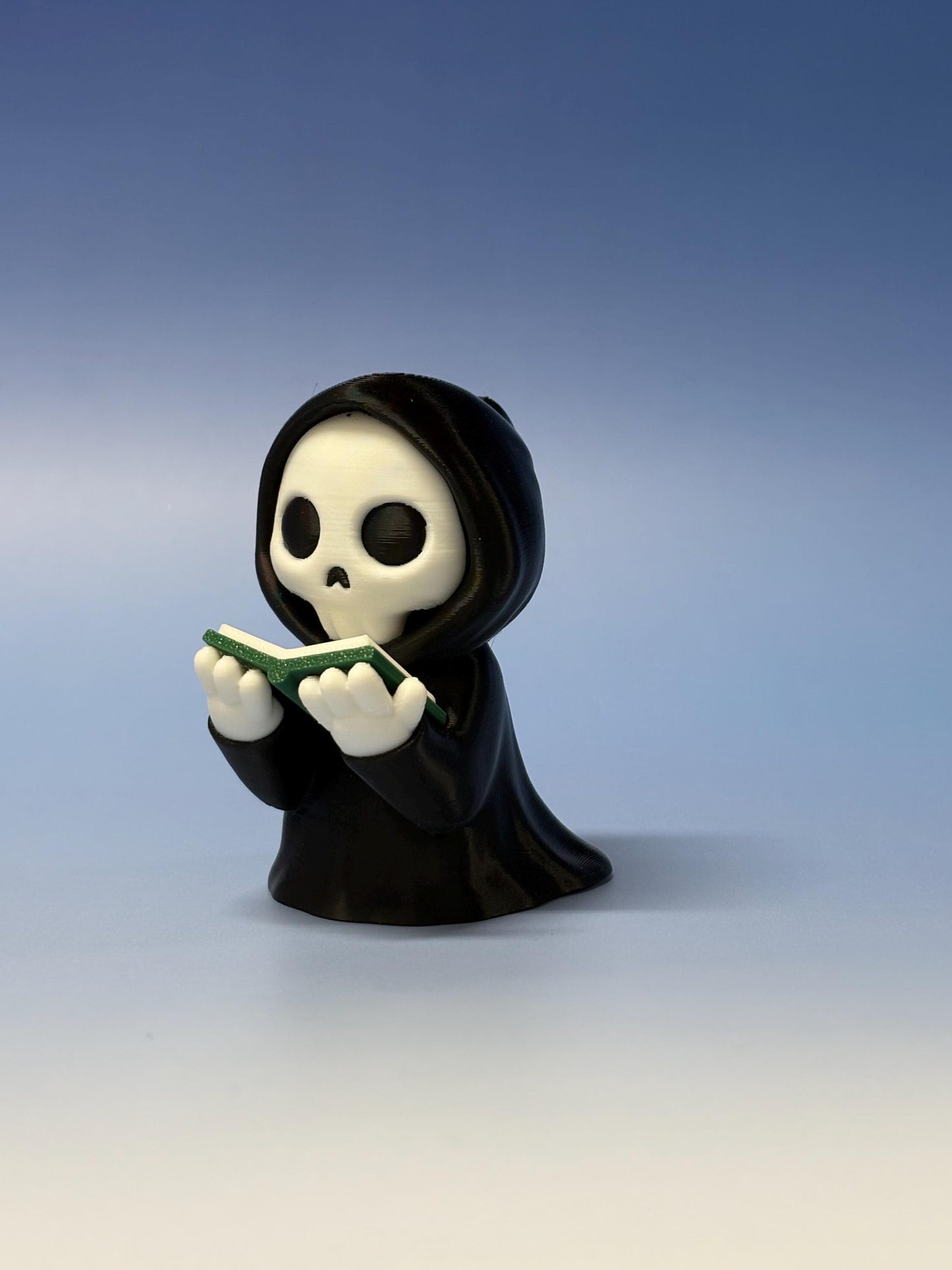 Reading Reaper Shelf Decor