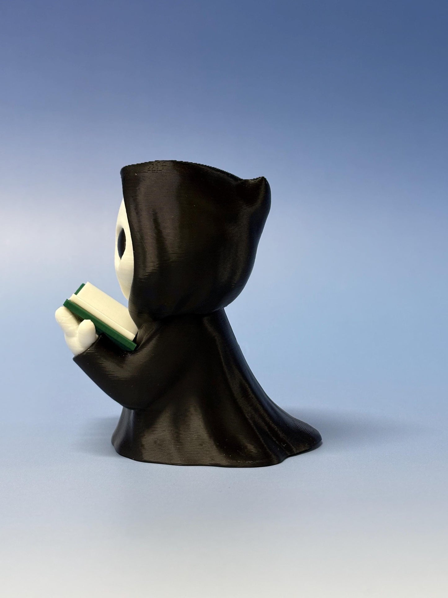 Reading Reaper Shelf Decor
