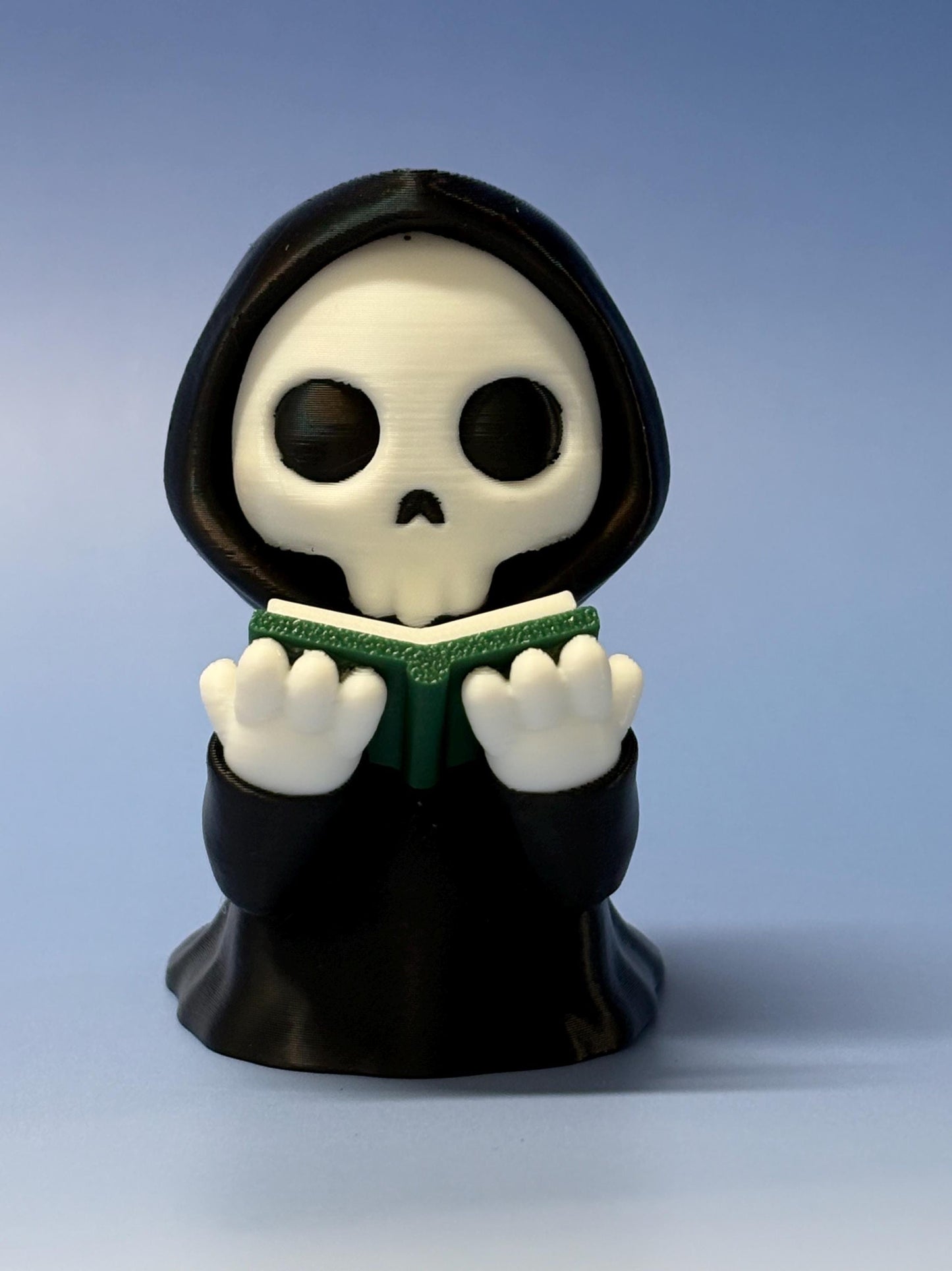 Reading Reaper Shelf Decor