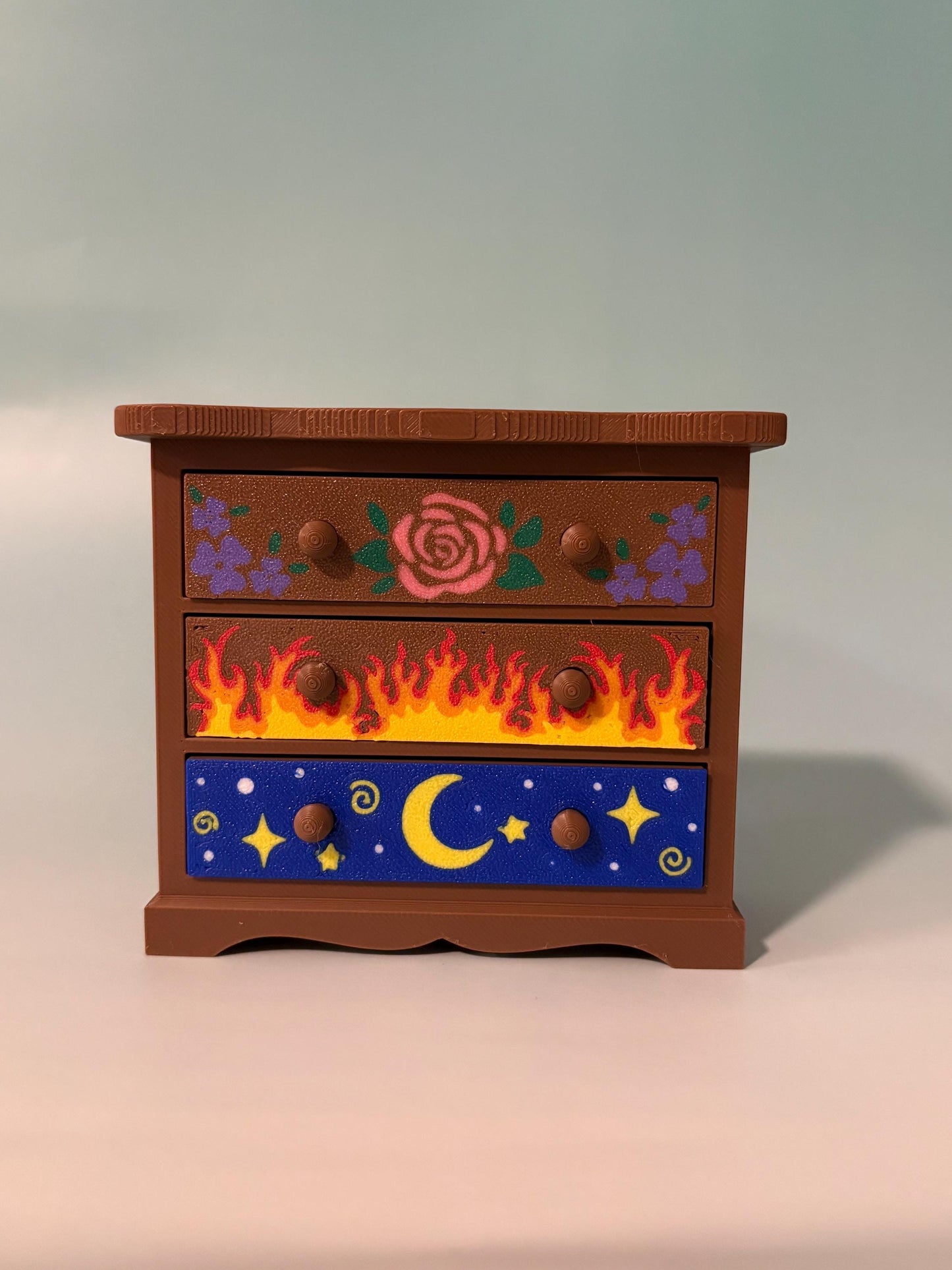 Fantasy inspired dresser bookshelf decor