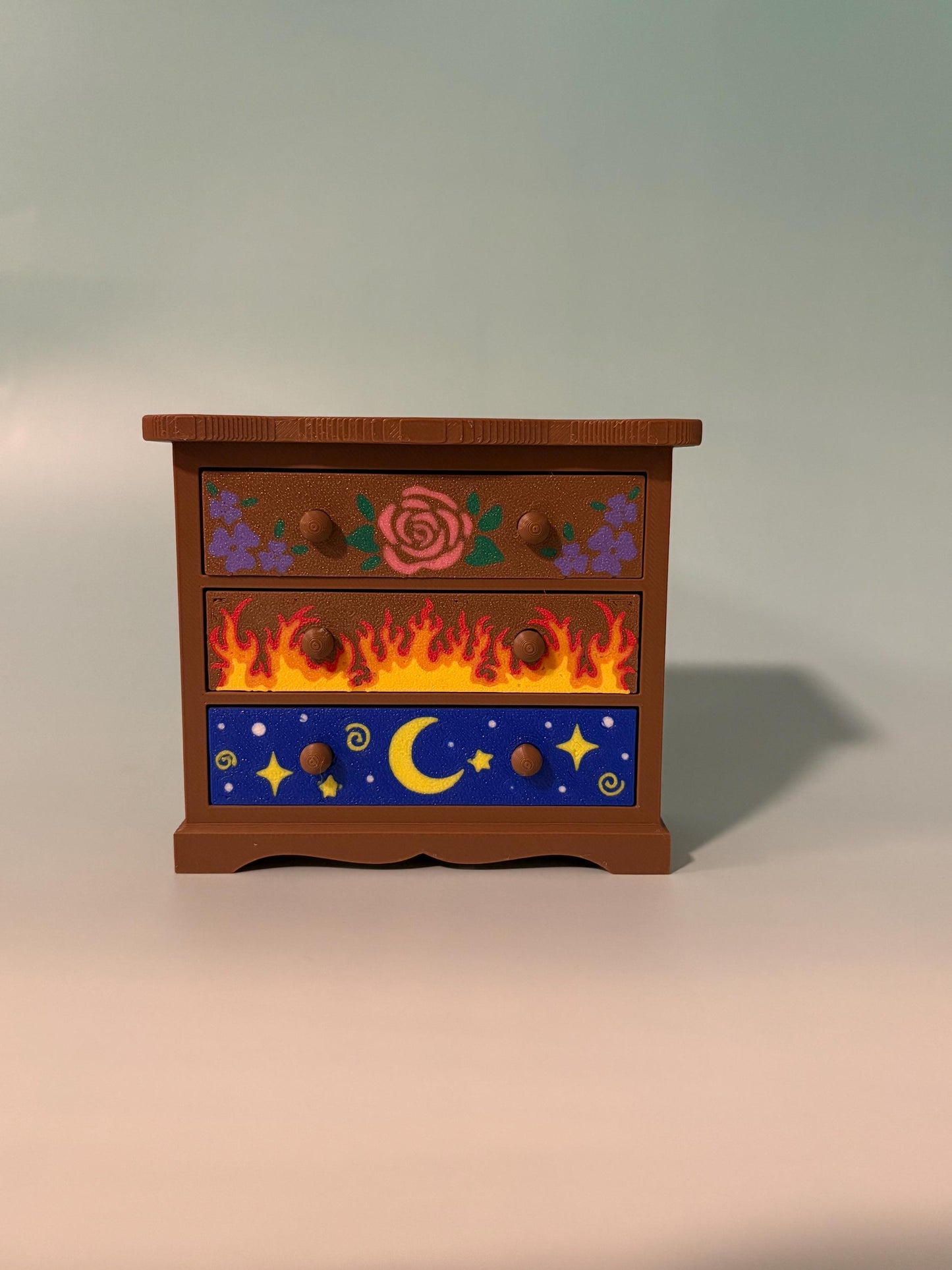 Fantasy inspired dresser bookshelf decor