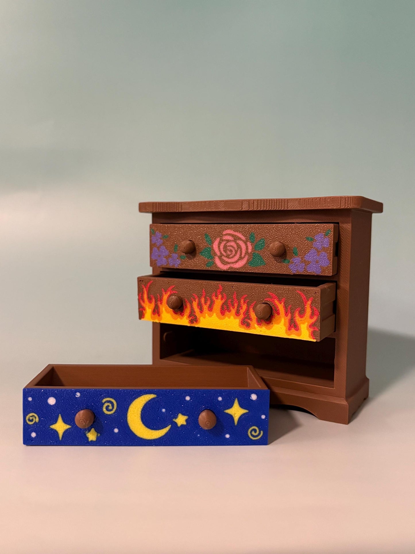 Fantasy inspired dresser bookshelf decor