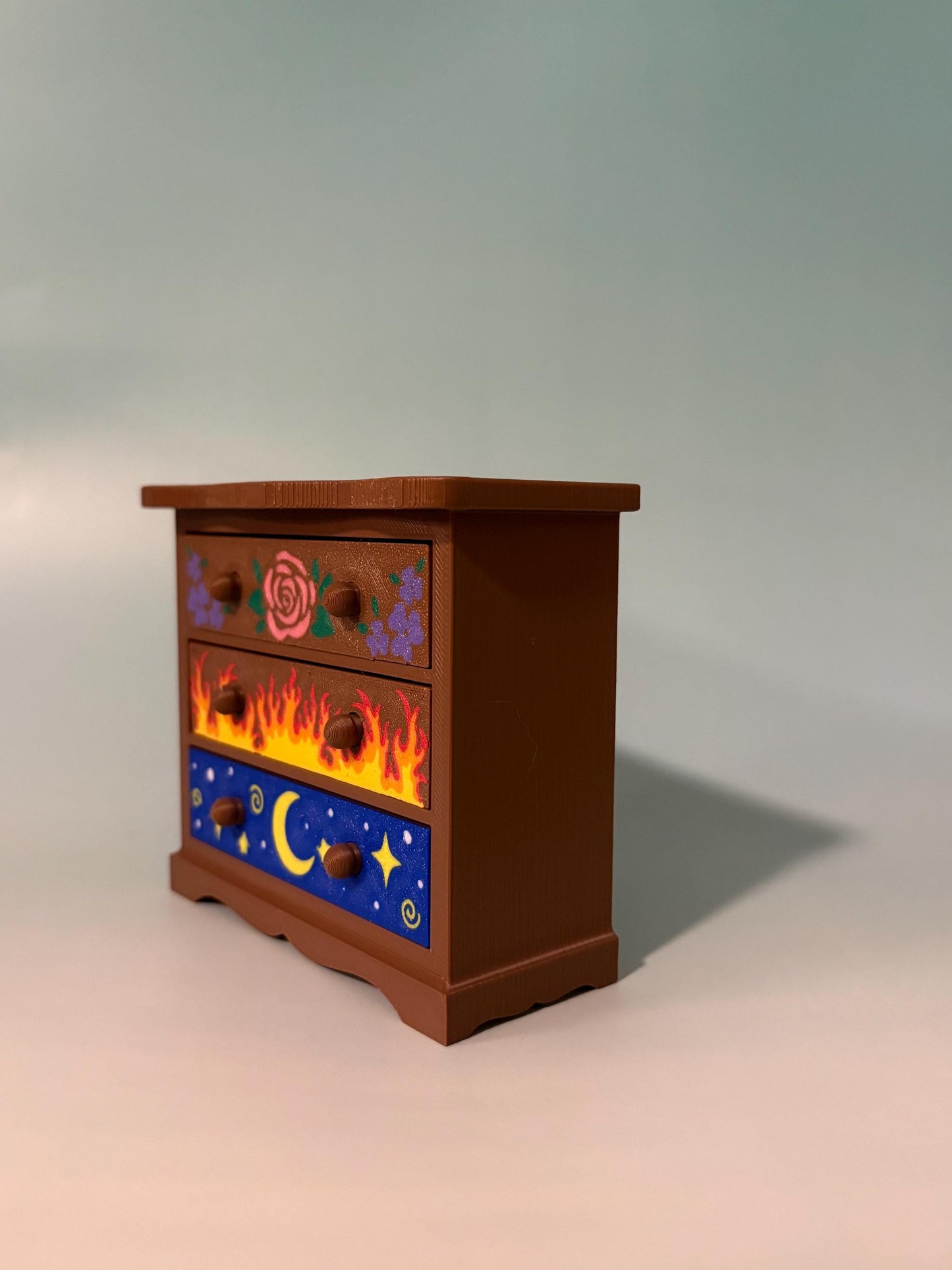Fantasy inspired dresser bookshelf decor